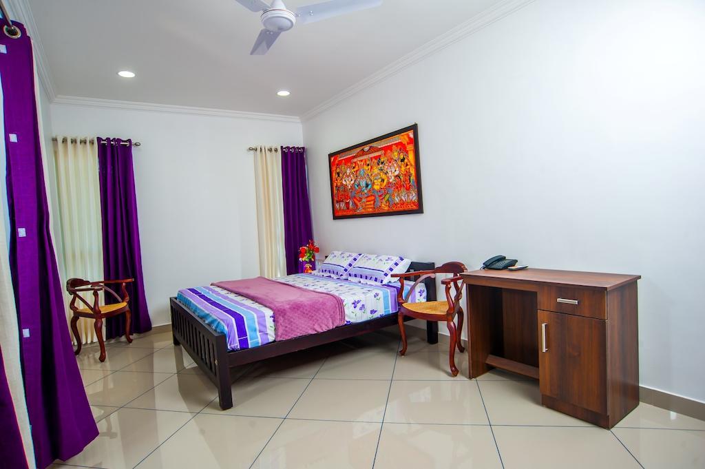 Vasudevam Premium Suites Thiruvananthapuram Bilik gambar